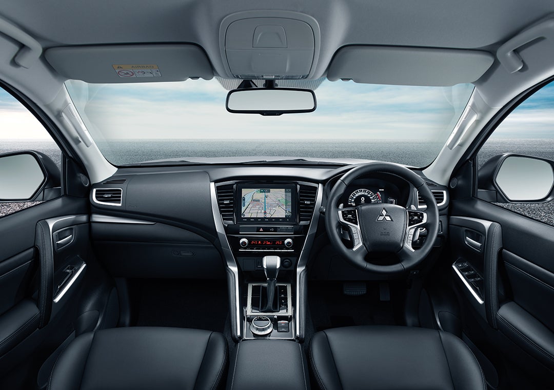 pajero sport 3 интерьер